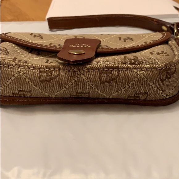 Dooney & Bourke tan & brown button flap wristlet - Picture 3 of 8